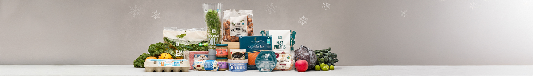 Ett urval av klassiska matvaror som brukar serveras på ett svenskt julbord.