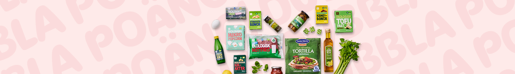 Olika ekologiska livsmedel utplacerade i form av ett hjärta mot en bakgrund med texten "Dubbla poäng".